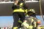 Des pompiers du service d'incendie de la ville de Boston dans le Boeing 787 de Japan Airlines